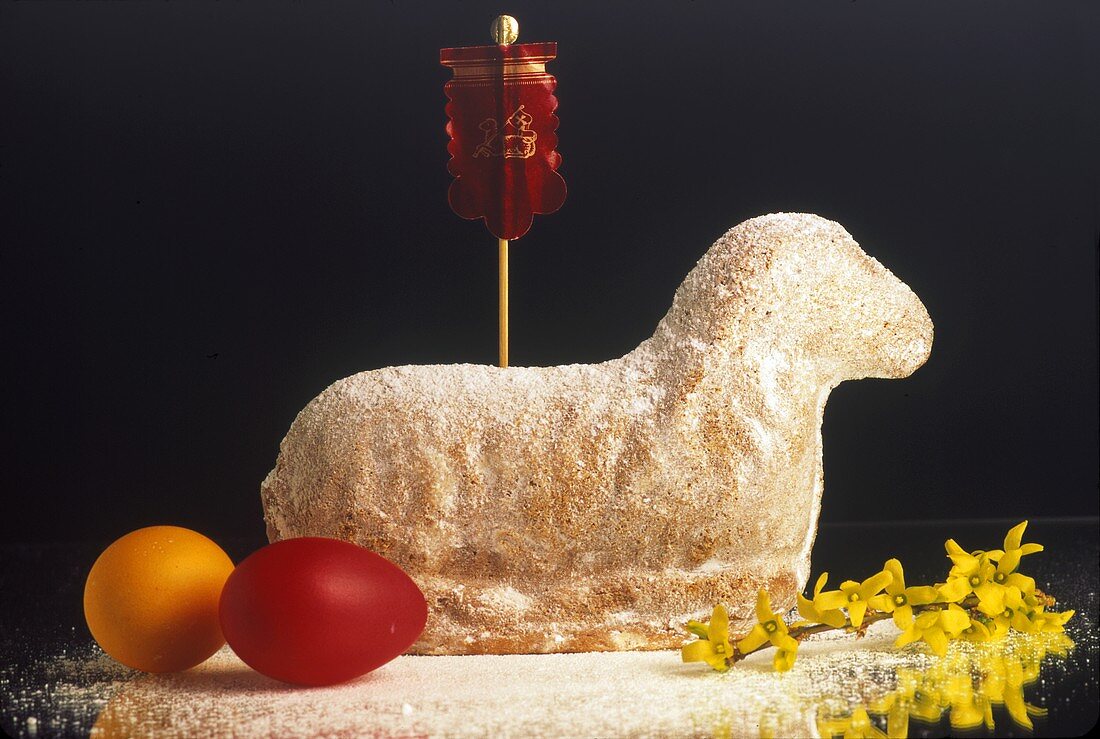 Easter lamb with icing sugar and coloured eggs