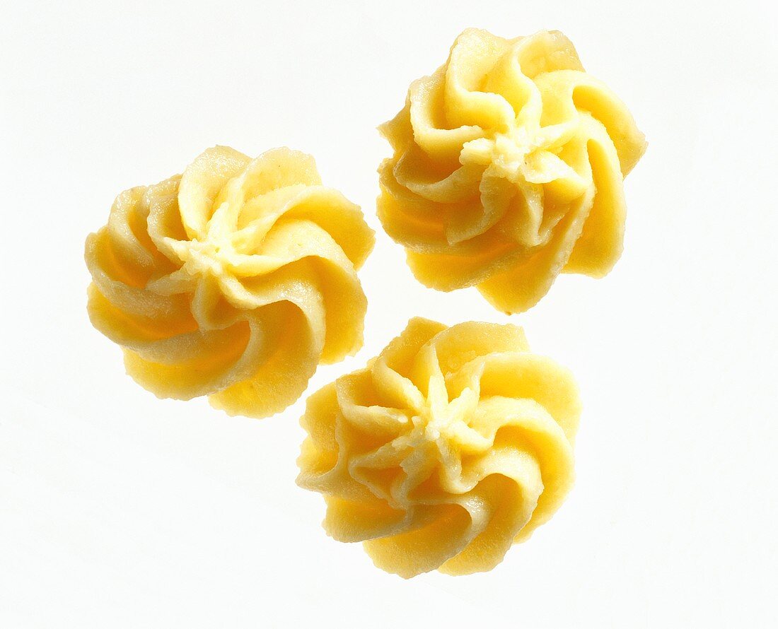 Three rosettes of mashed potato