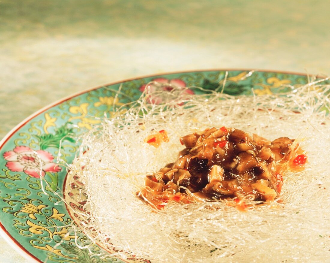 Tongku mushrooms with chili peppers & ginger on glass noodles