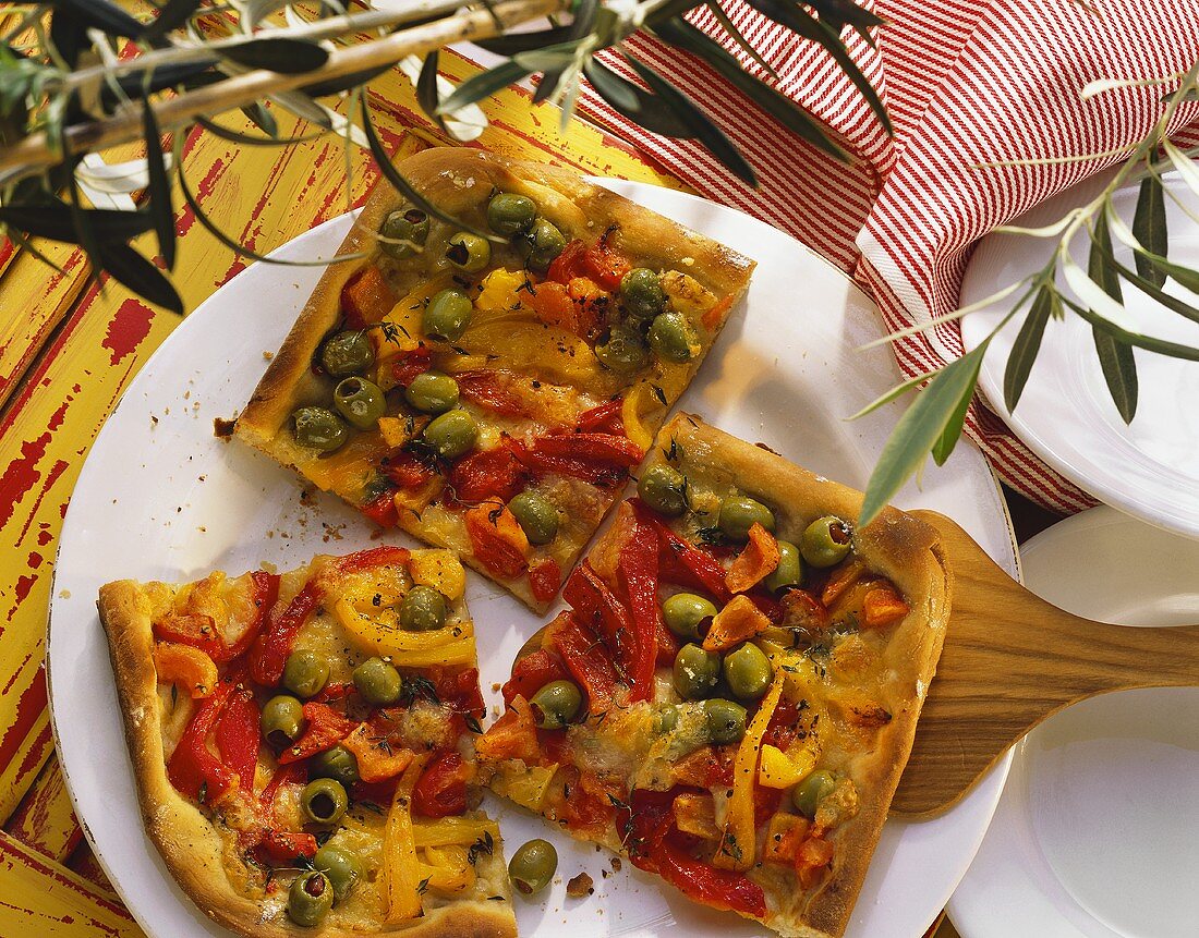 Olive quiche with red and yellow peppers