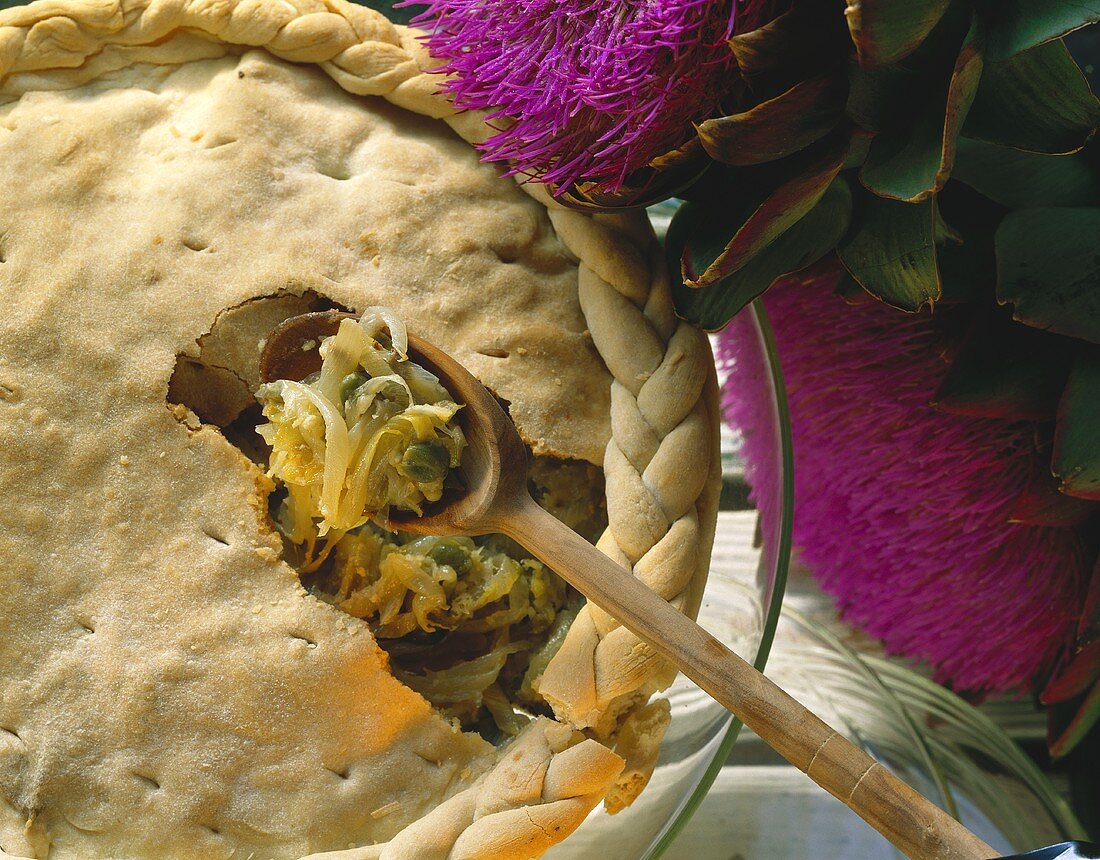 Anchovy and chicory tart with capers and woven edge