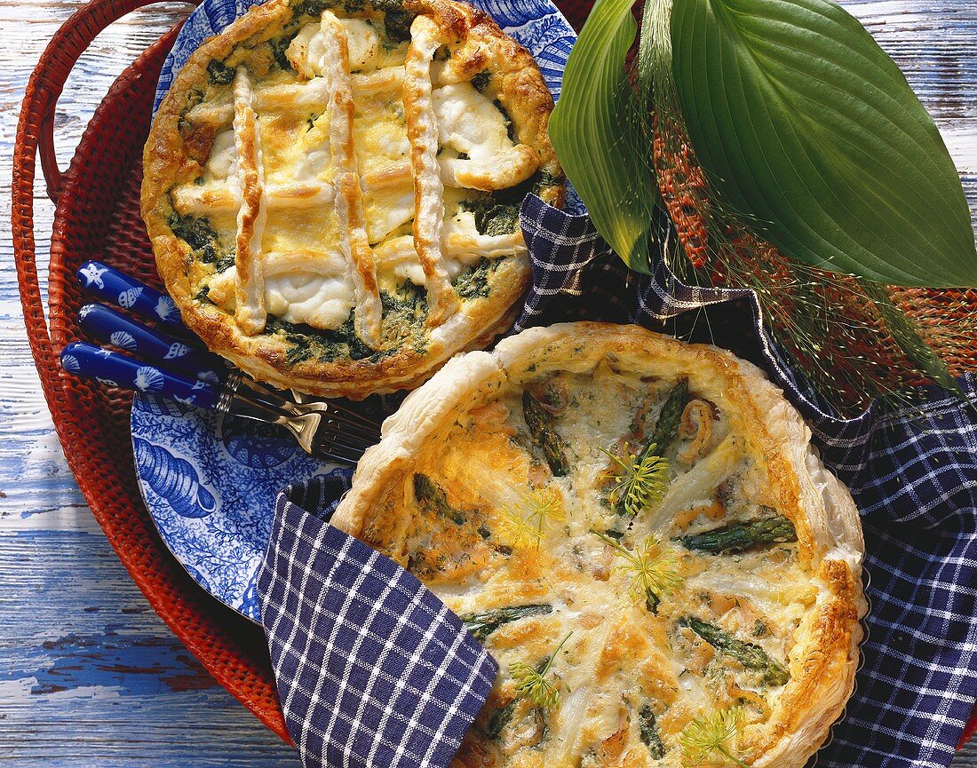 Spinach quiche with monkfish; salmon-asparagus quiche with dill
