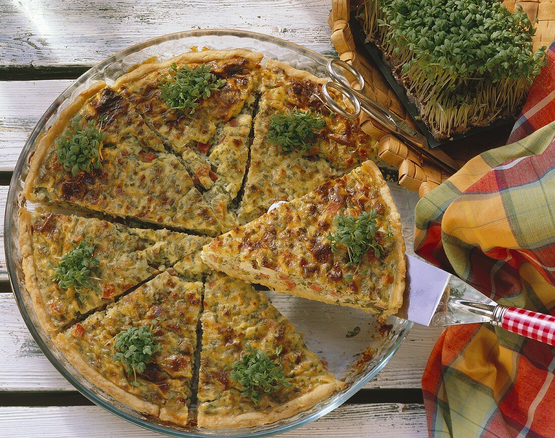 Spring quiche with ham and cress, in pieces