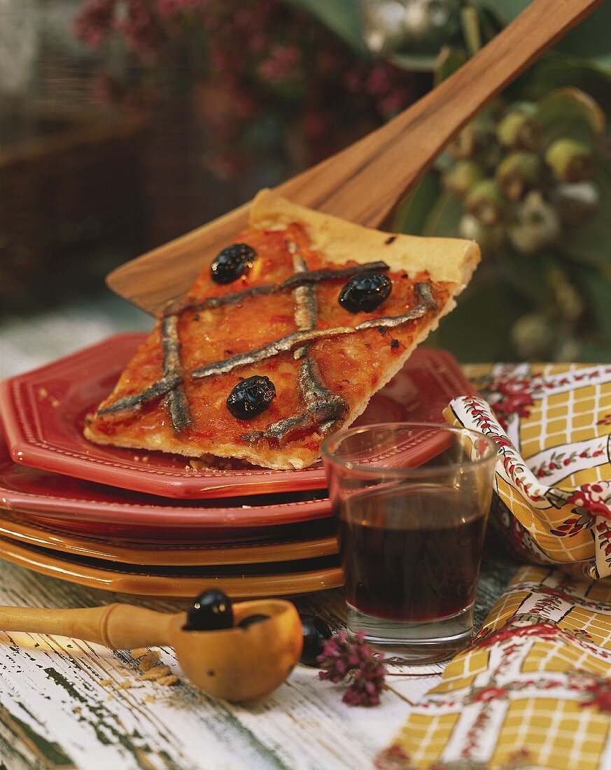 Pissaladiere (onion pizza) with anchovies and olives