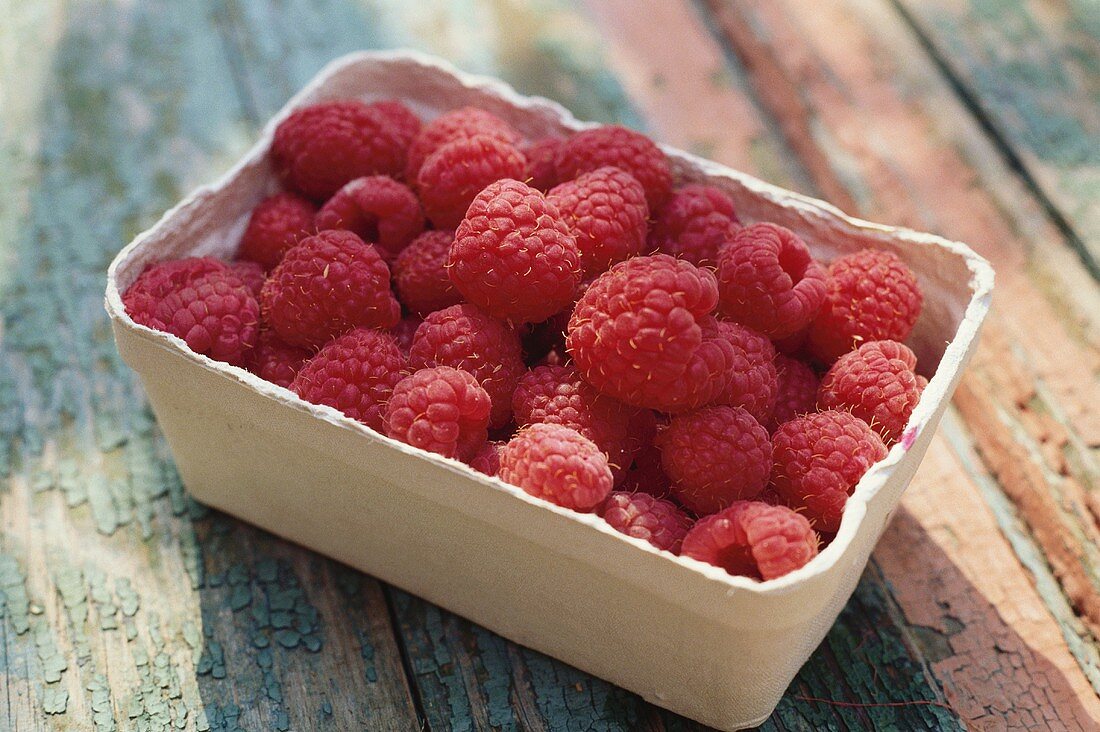 Ripe Raspberries in a Container
