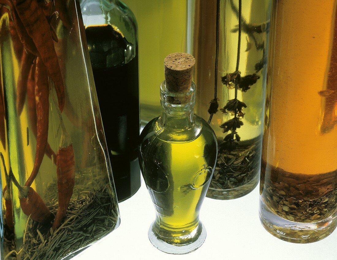 Assorted Vinegar and Oil in Decorative Bottles