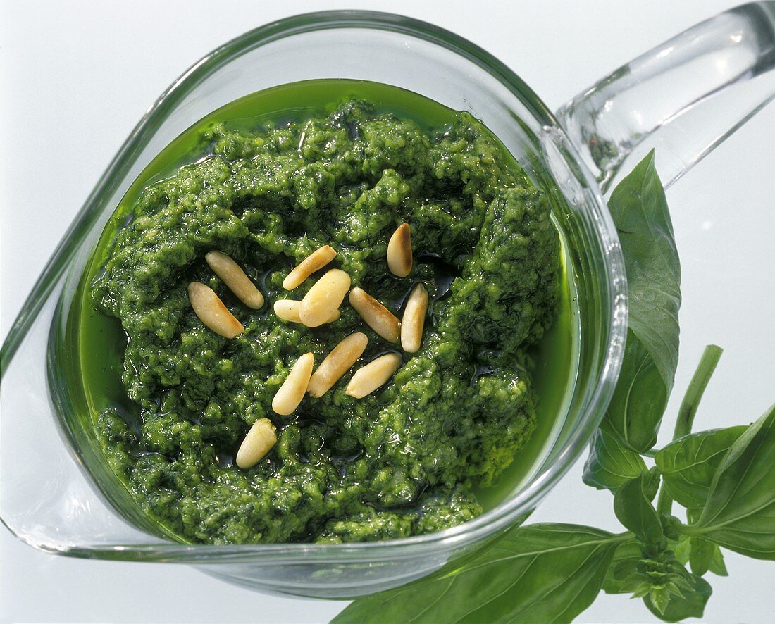 Pesto in a Glass Pitcher with Pine Nuts