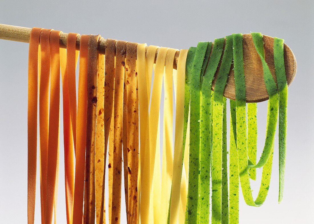 Colored Ribbon Pasta on a Wooden Spoon
