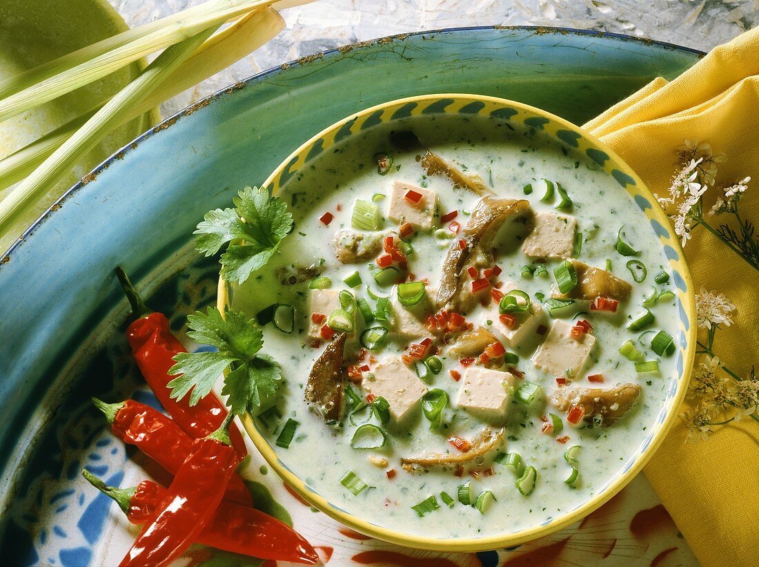 Thai soup with lemon grass, tofu, chili & mushrooms