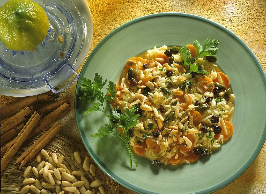 Carrot pilau with currants, pistachios and pine nuts