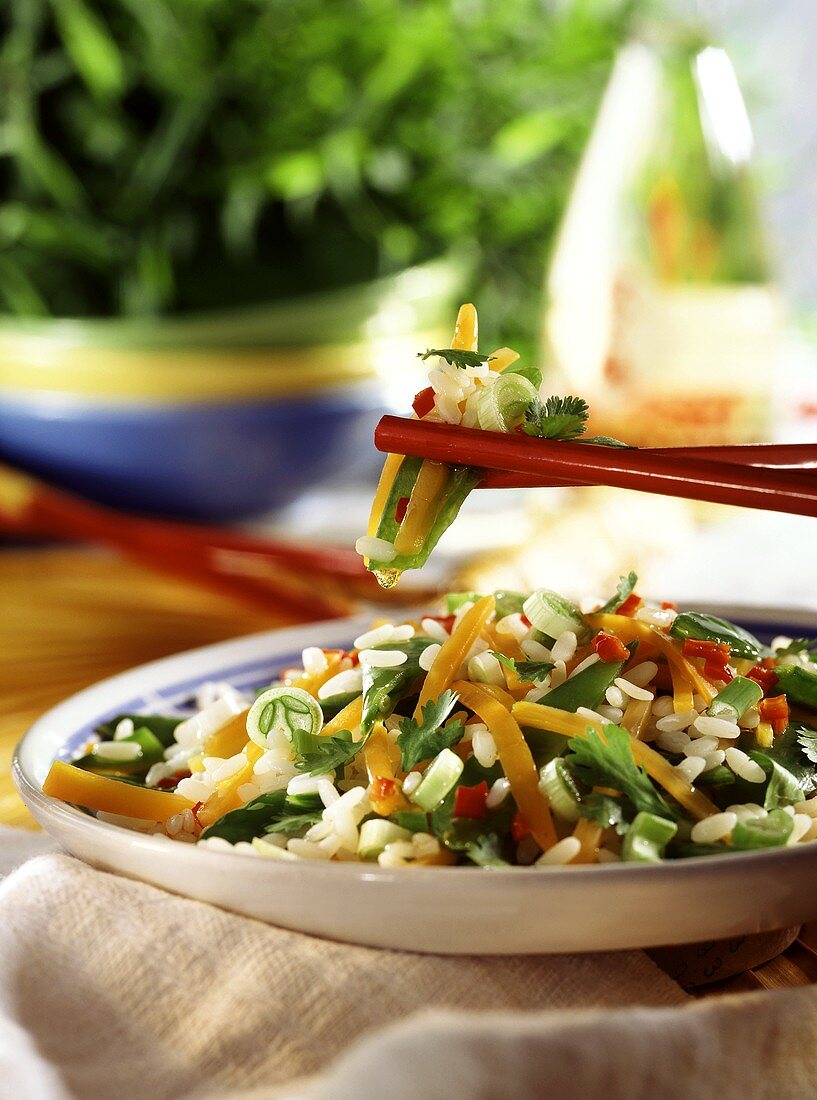 Rice salad with vegetables and coriander leaves