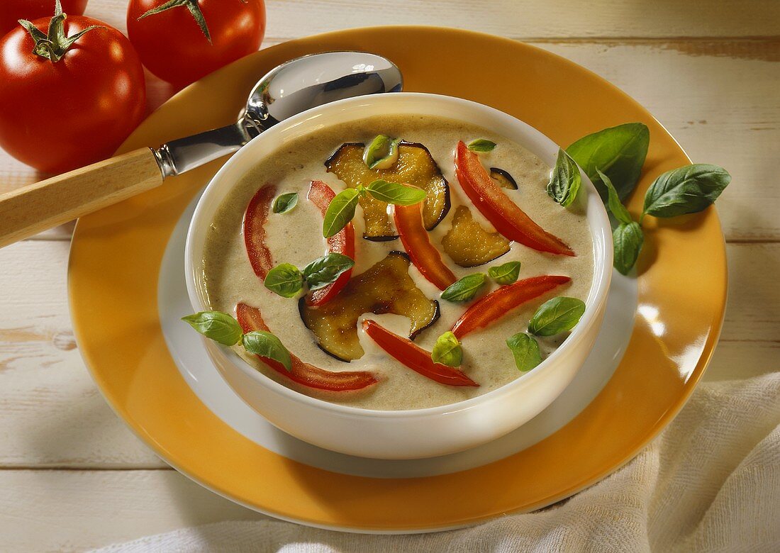 Aubergine soup with fried aubergines, tomatoes & basil