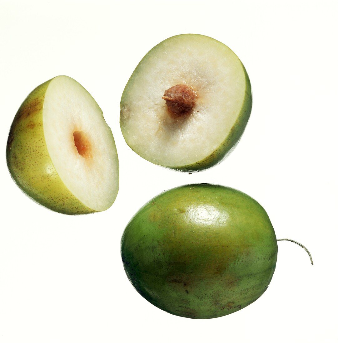 Jujube fruits, whole and cut into two halves