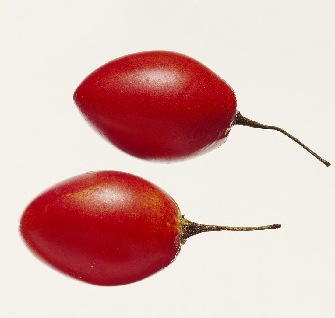 Two whole tamarillos