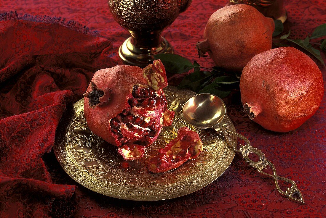 A Broken Pomegranate on a Fancy Plate