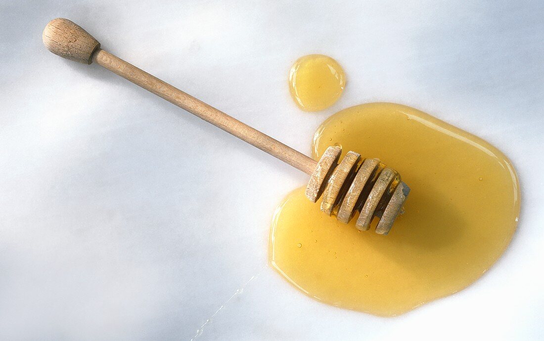 Honey with a honey spoon