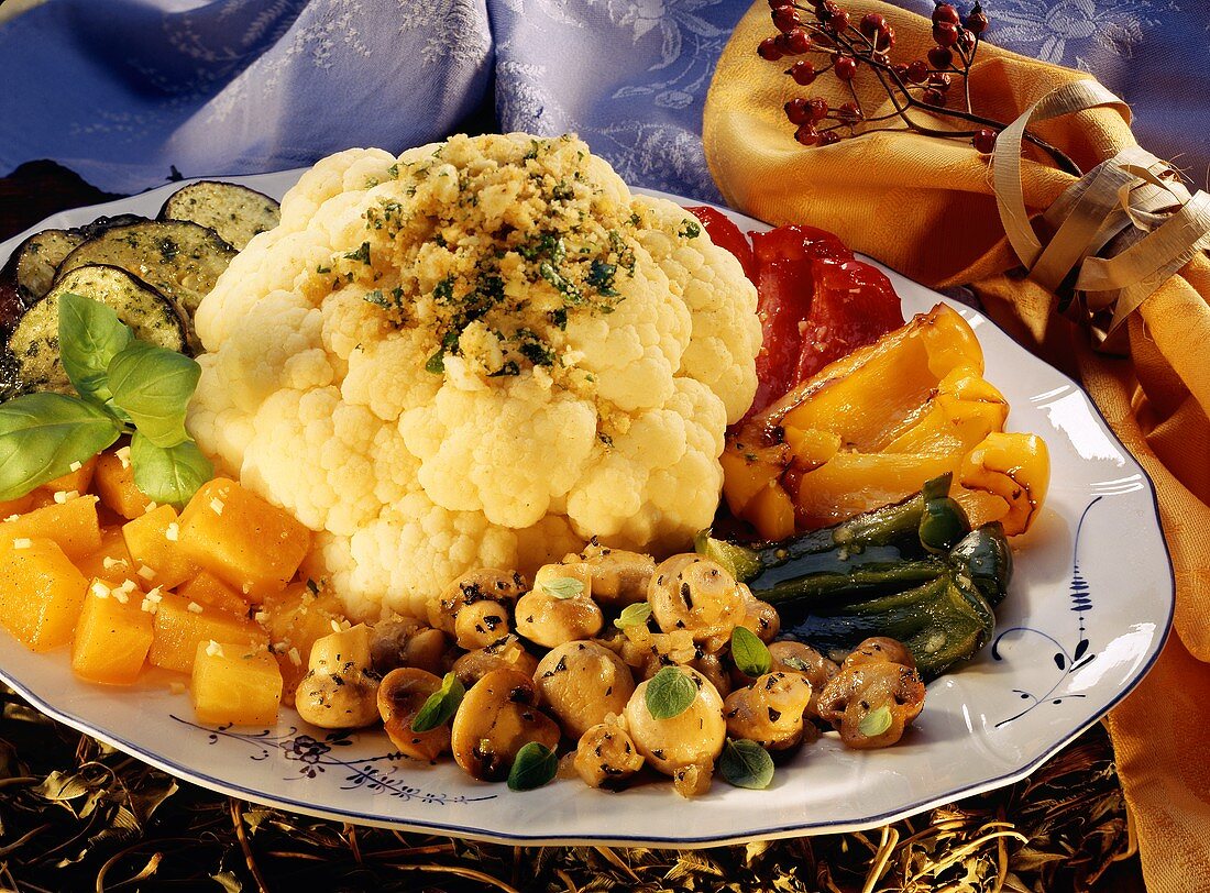 Autumn vegetable platter with cauliflower, pumpkin, mushrooms 