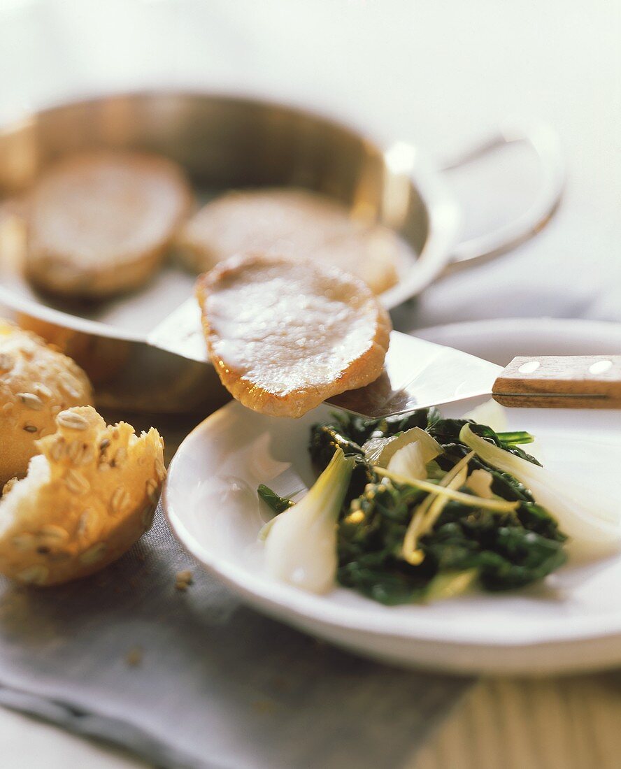 Veal escalope with spinach and lemon