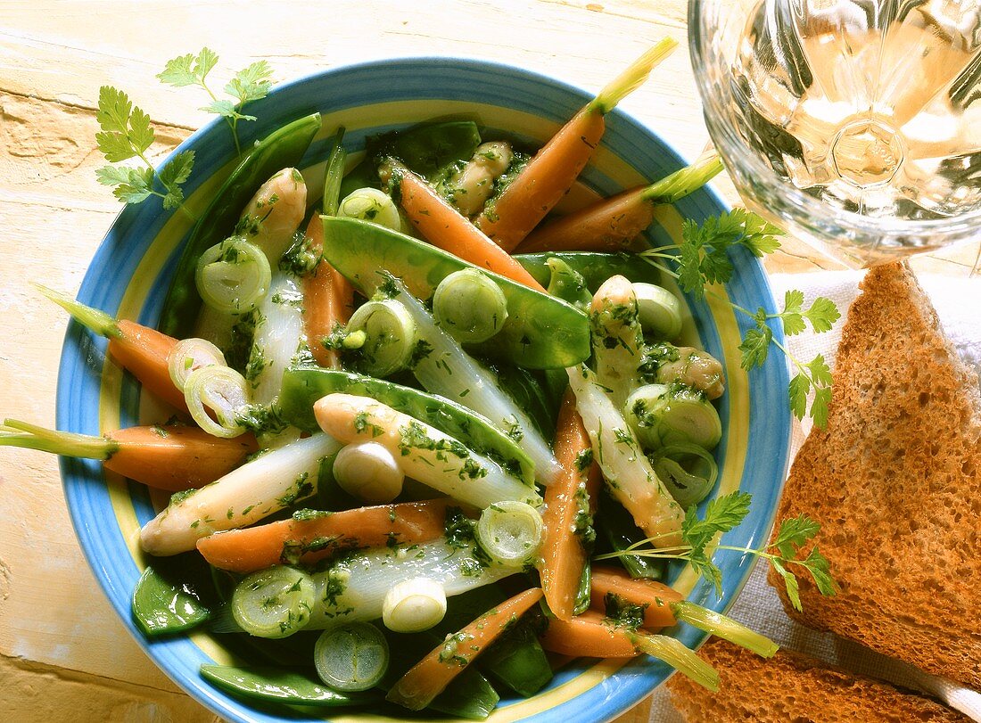 Vegetable salad with spring herbs