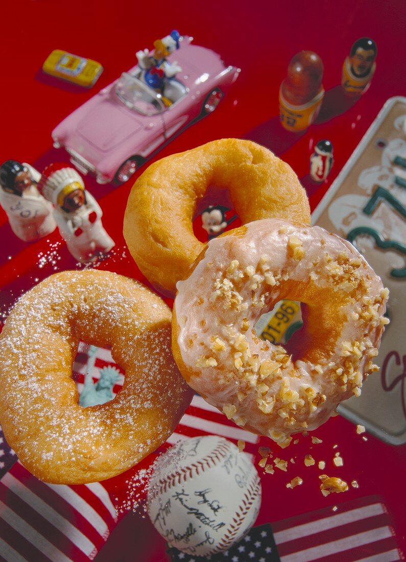 Three different doughnuts above American decoration