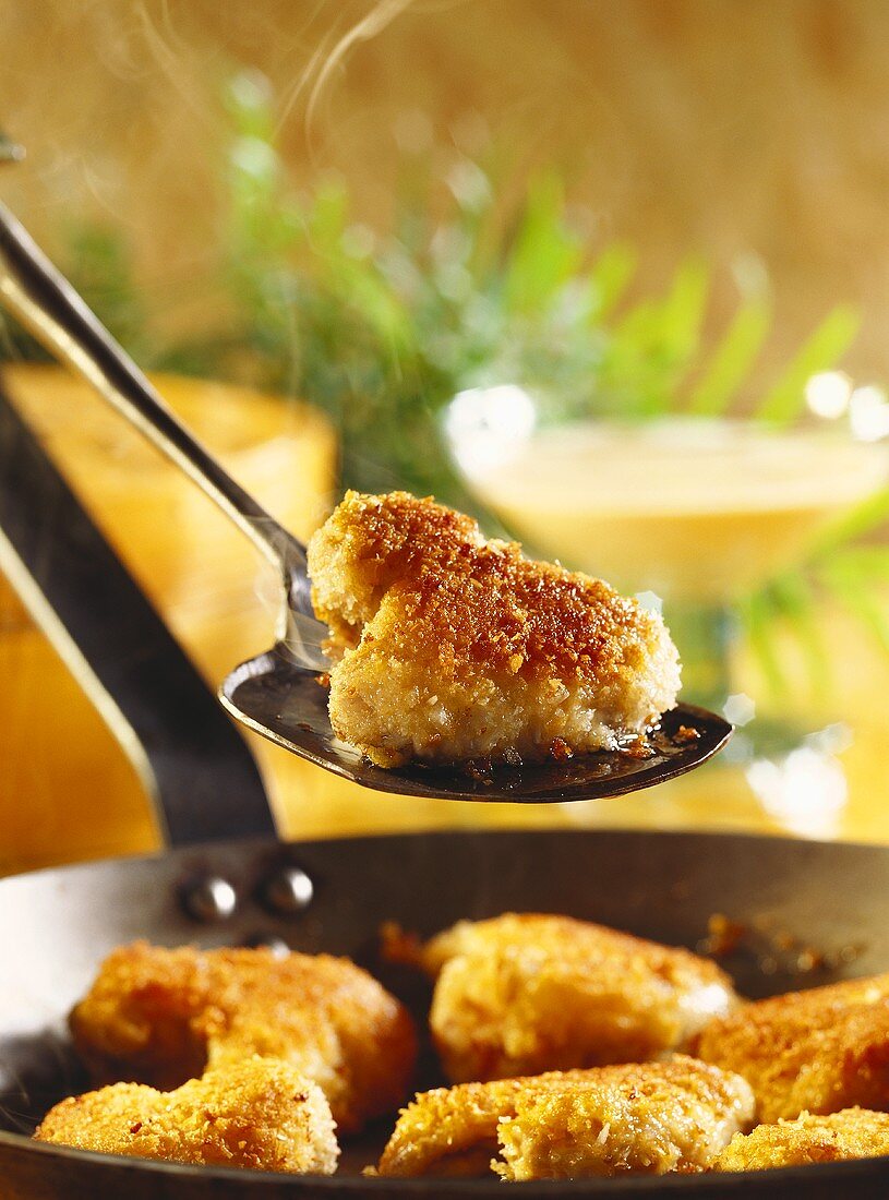Chicken wing in batter with coconut sauce (steaming piece)