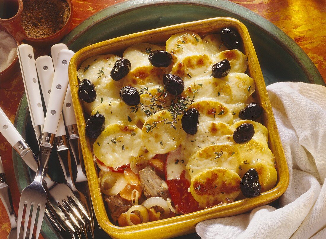 Provencal potato casserole with veal and olives