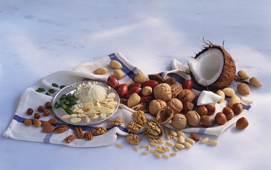 Various types of nuts on a kitchen cloth