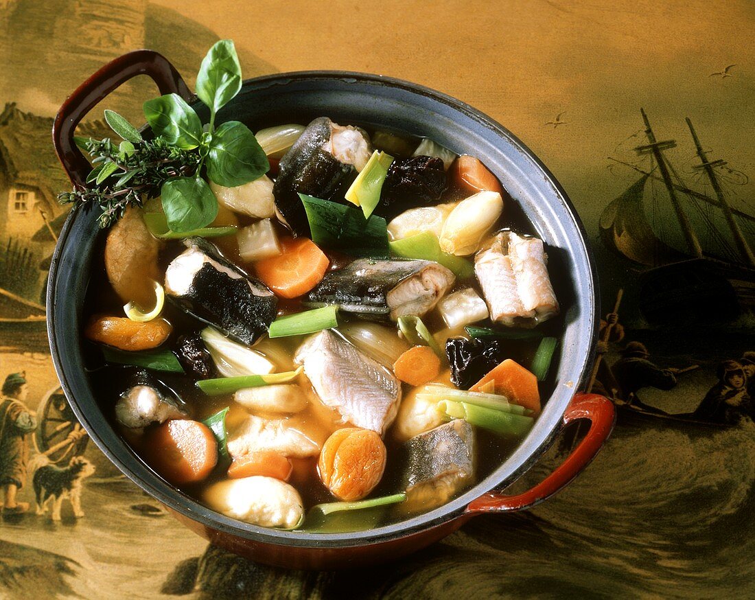 Hamburg eel soup with dried fruit in pot on old picture