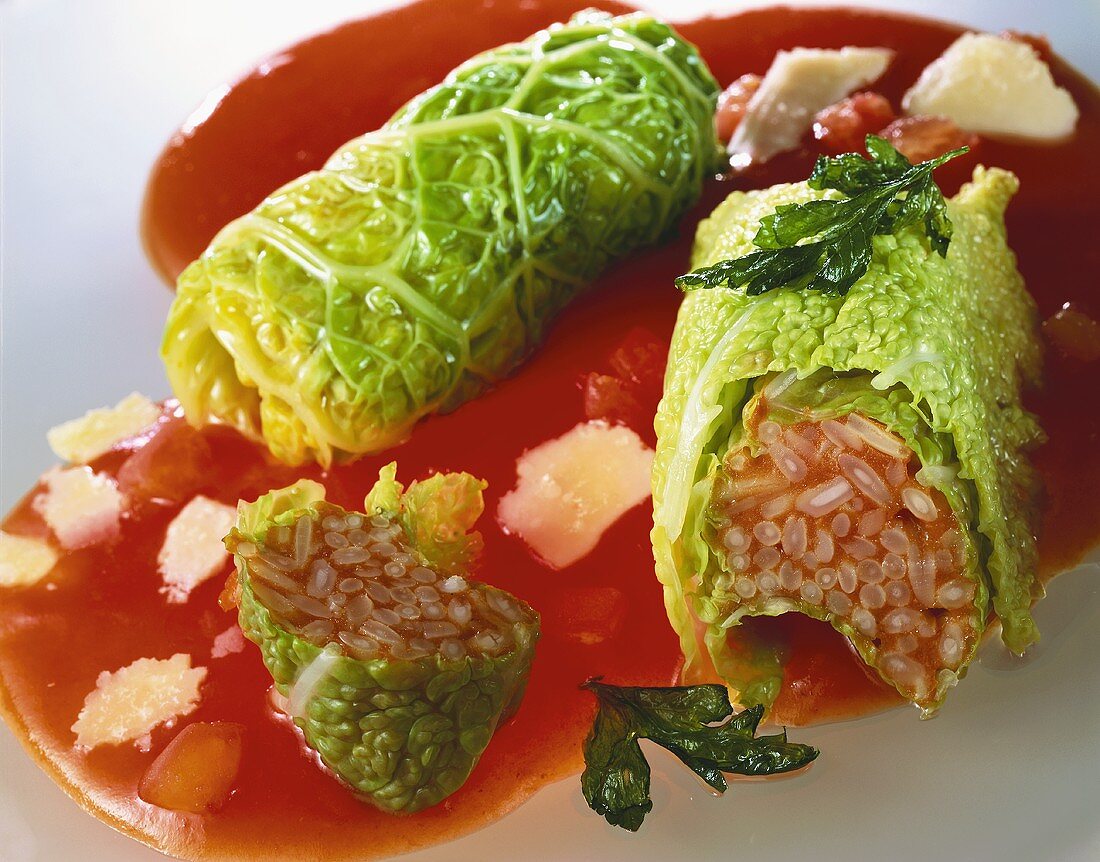 Stuffed cabbage with tomato rice, tomato sauce and Parmesan