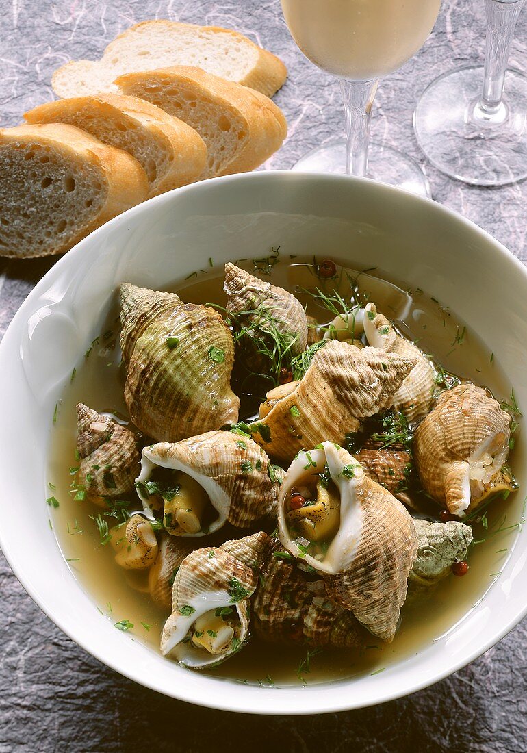 Whelks in pepper stock with aioli; baguette