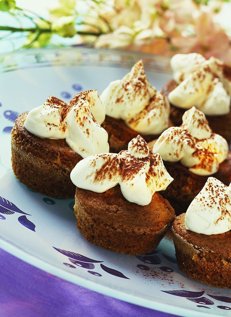 Pharisee (rum coffee) muffins with whipped cream & cocoa powder
