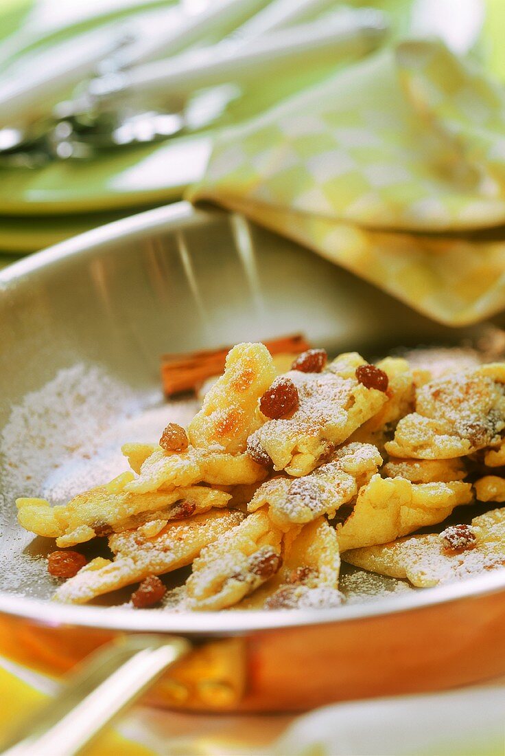 Emperor's pancake with icing sugar and raisins