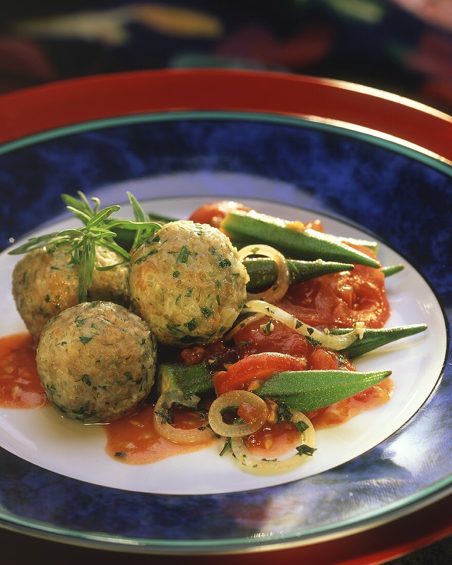 Green rye dumplings with okra, summer savory and tomatoes