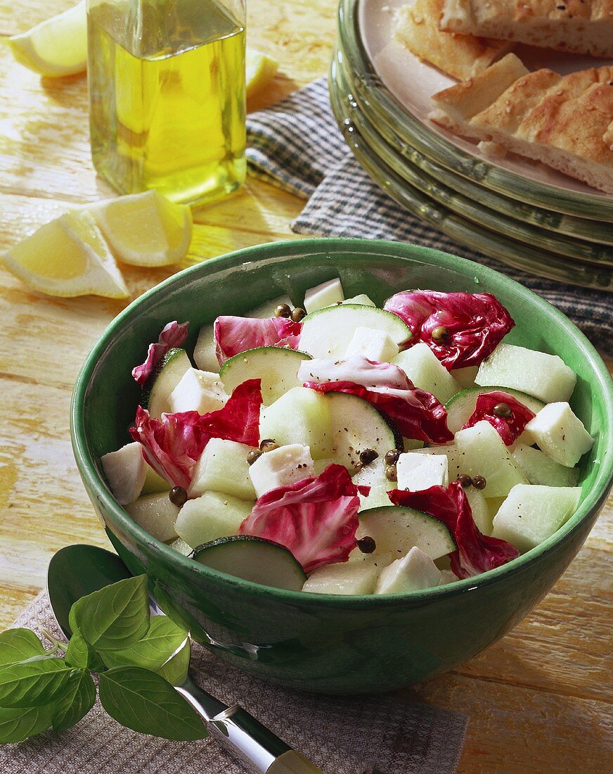 Spicy melon salad with radicchio, courgettes and mozzarella