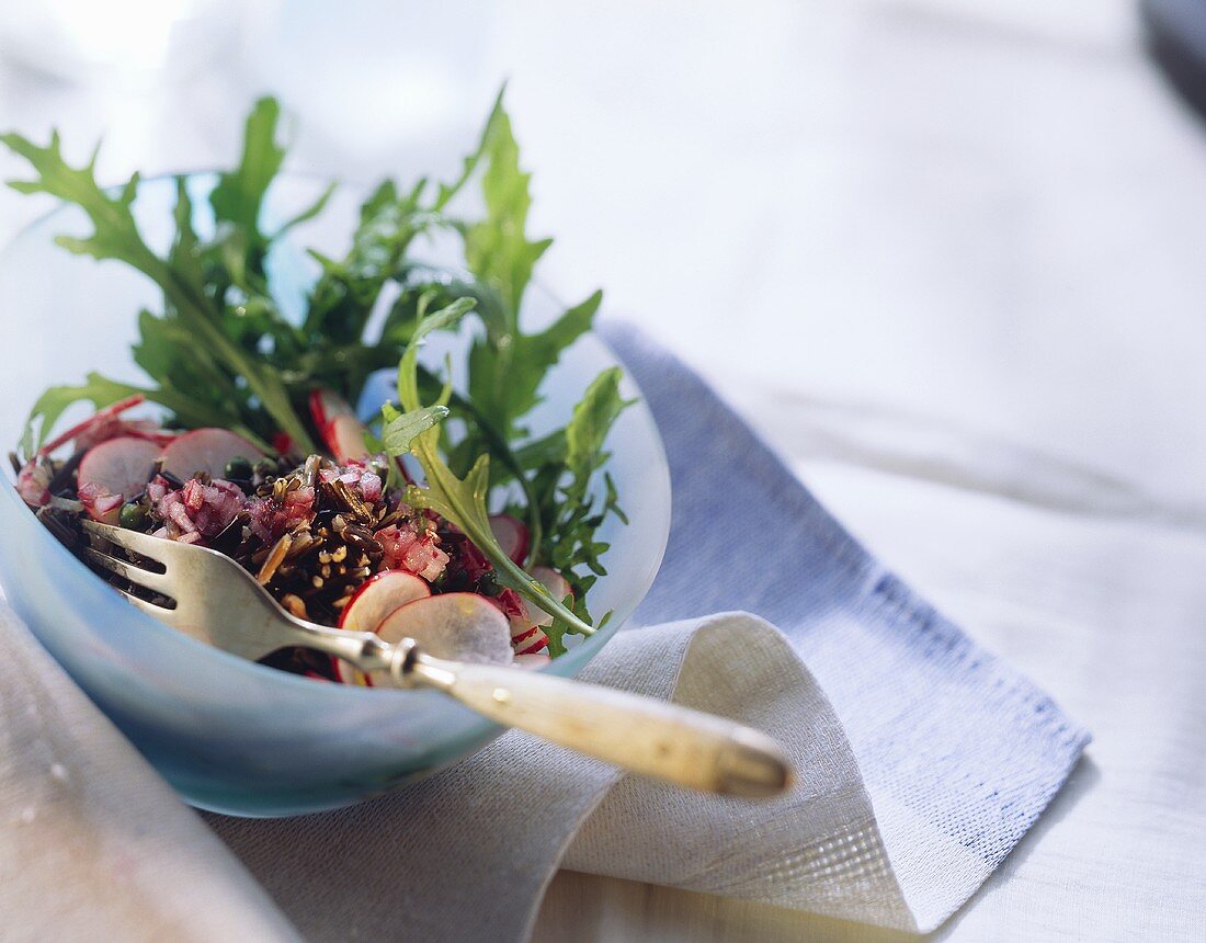 Rocket and wild rice salad with radishes and ginger