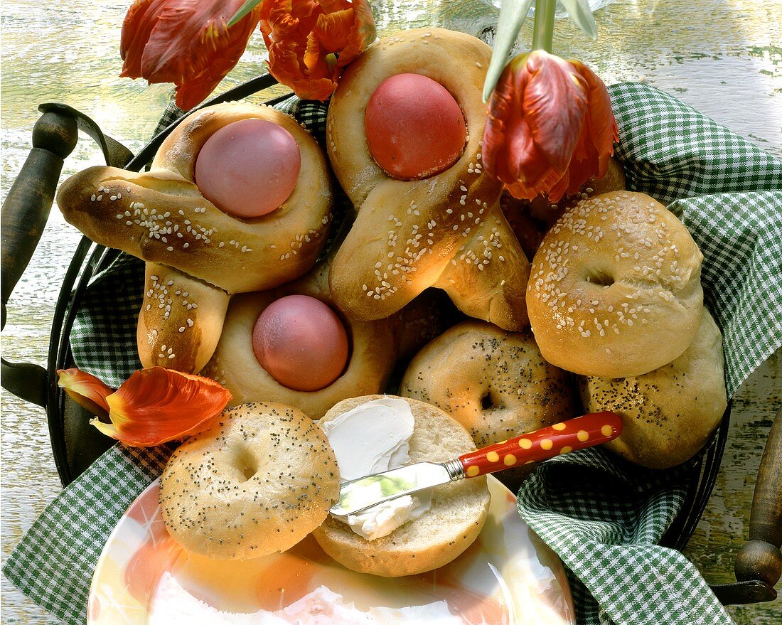 Greek Easter bows with Easter eggs; bagels with butter