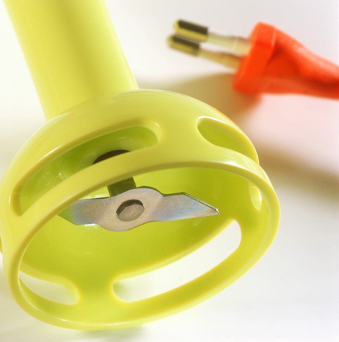 Electric hand mixer (under side) in pale-green plastic
