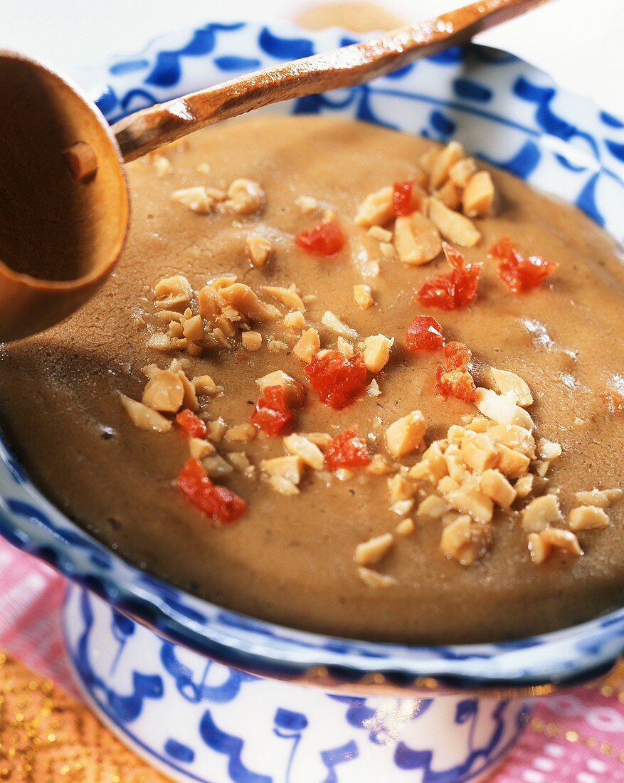 Peanut sauce with chopped peanuts and chili