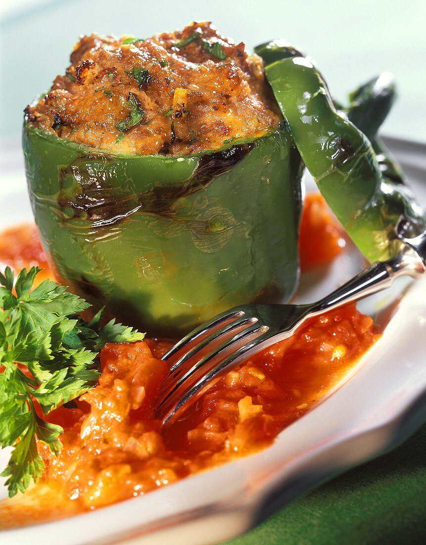 Stuffed peppers with mince and tomato sauce