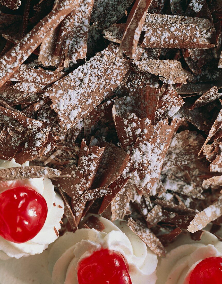 Black Forest cherry cake (detail): chocolate curls, cherries (1