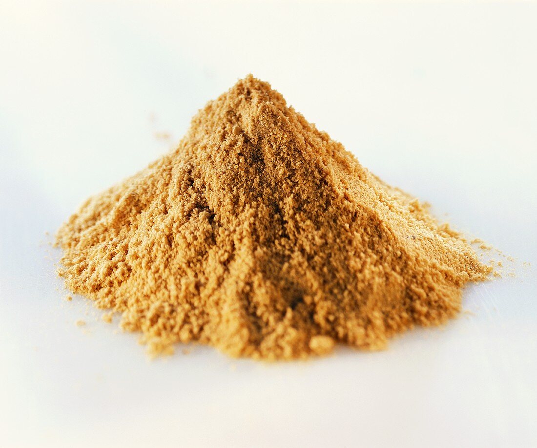 Mustard powder on a white background