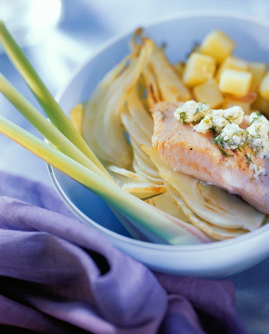 Salmon fillet on fennel with feta and lemon grass