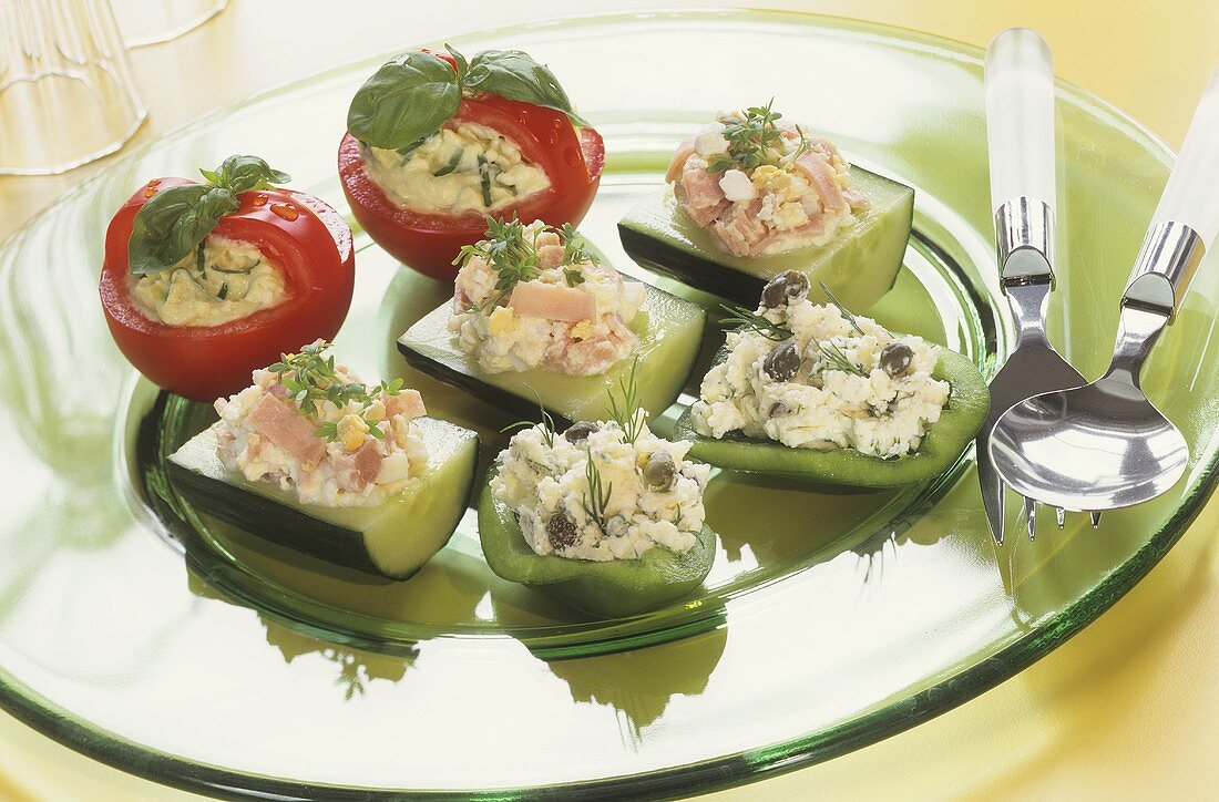 Tomato baskets, stuffed cucumbers & peppers on a plate
