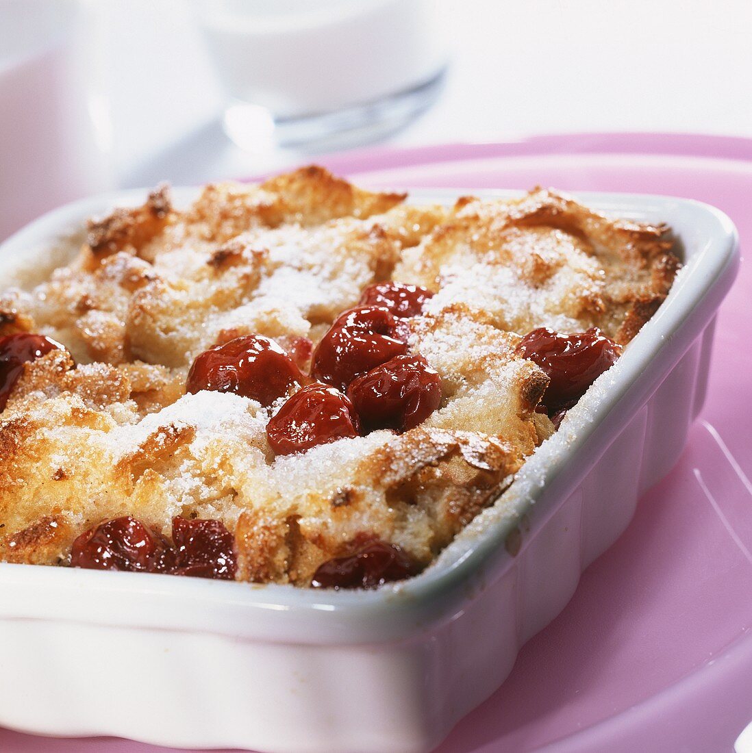 Cherry bread pudding in baking dish