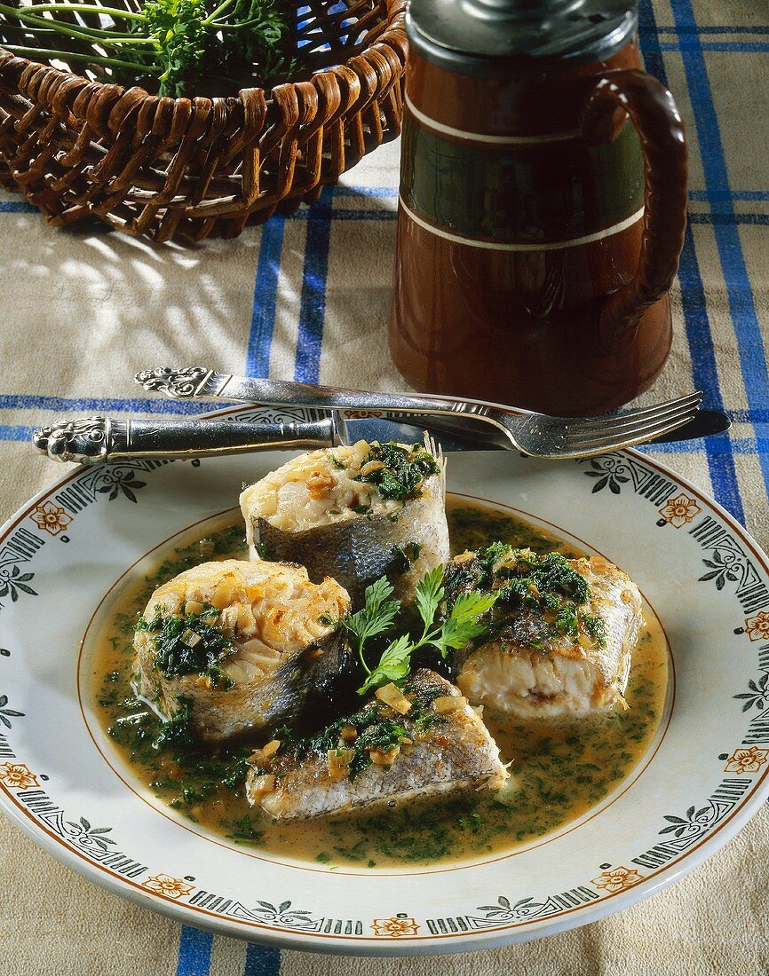 Hake in brown beer sauce with herbs; tankard