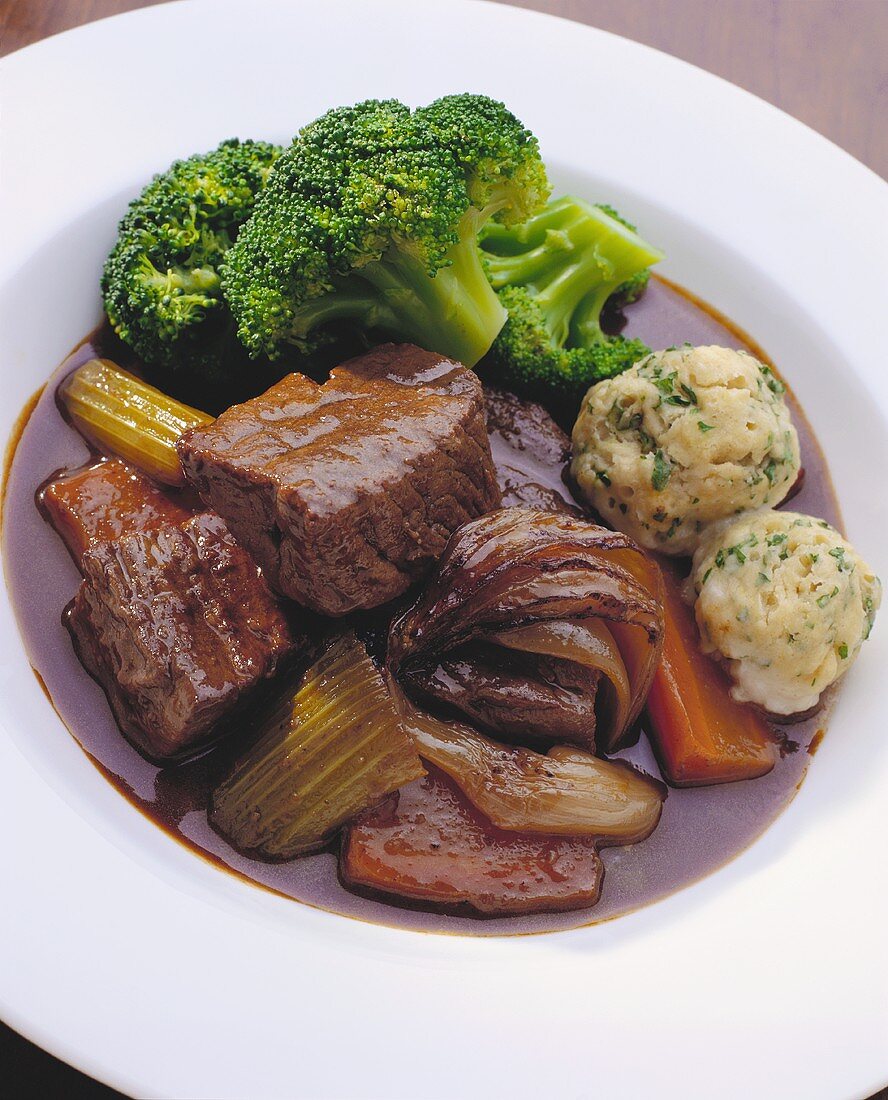 Beef stew with vegetables and small dumplings