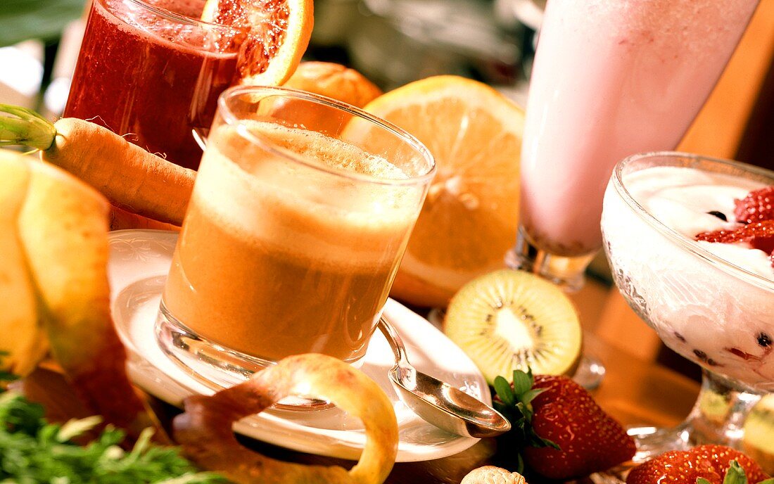 Orange and apple juice, yoghurt with strawberries, milkshake