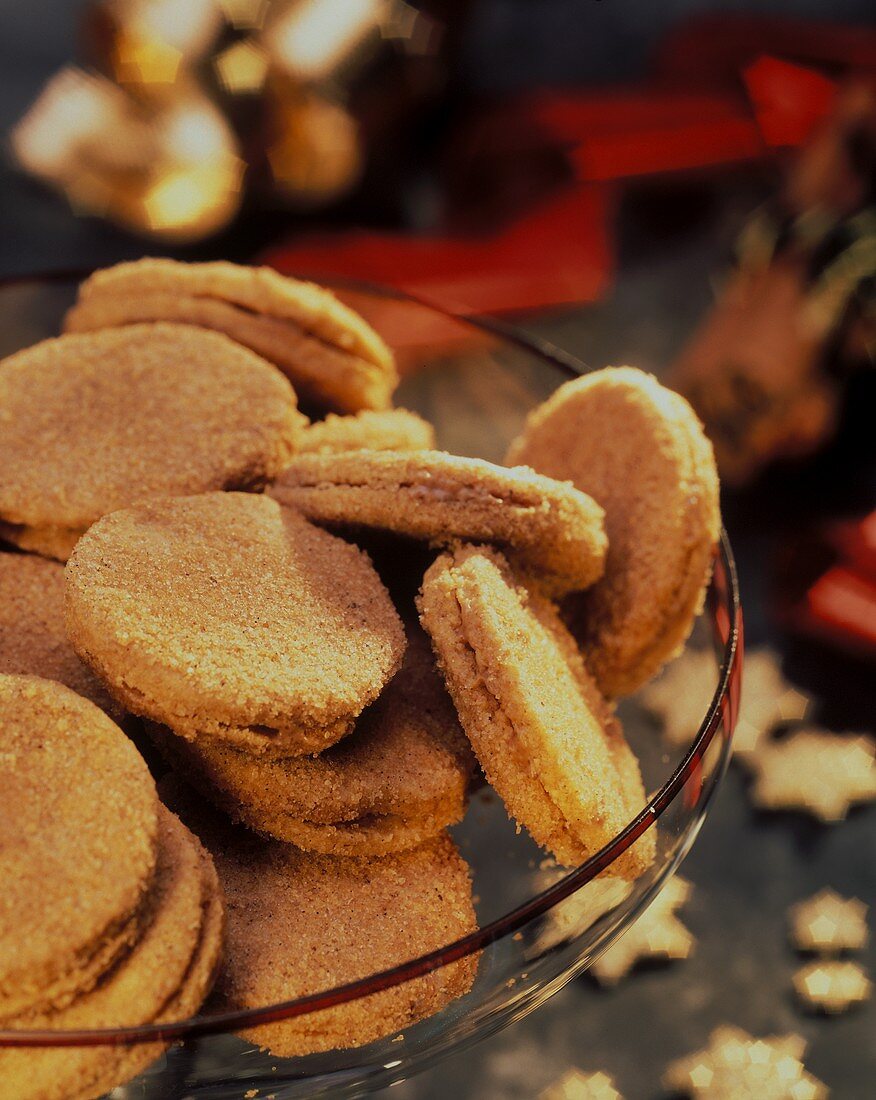 Crisp almond biscuits in glass bowl for Christmas