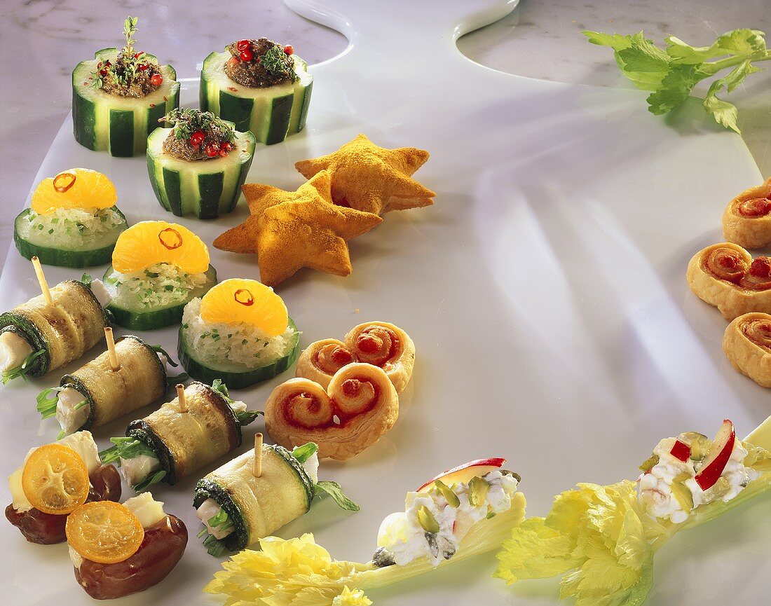 Various vegetarian snacks on a marble platter 