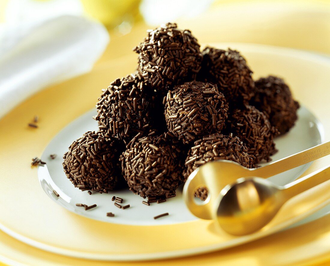 Rum truffles with chocolate vermicelli on plate